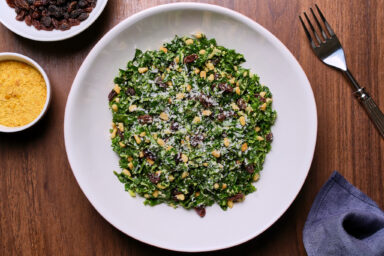 Kale Salad With Raisins, Pine Nuts, and Parmesan
