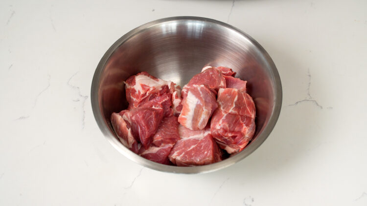 Pork butt cut into 2 1/2 x 3in chunks for Carnitas.